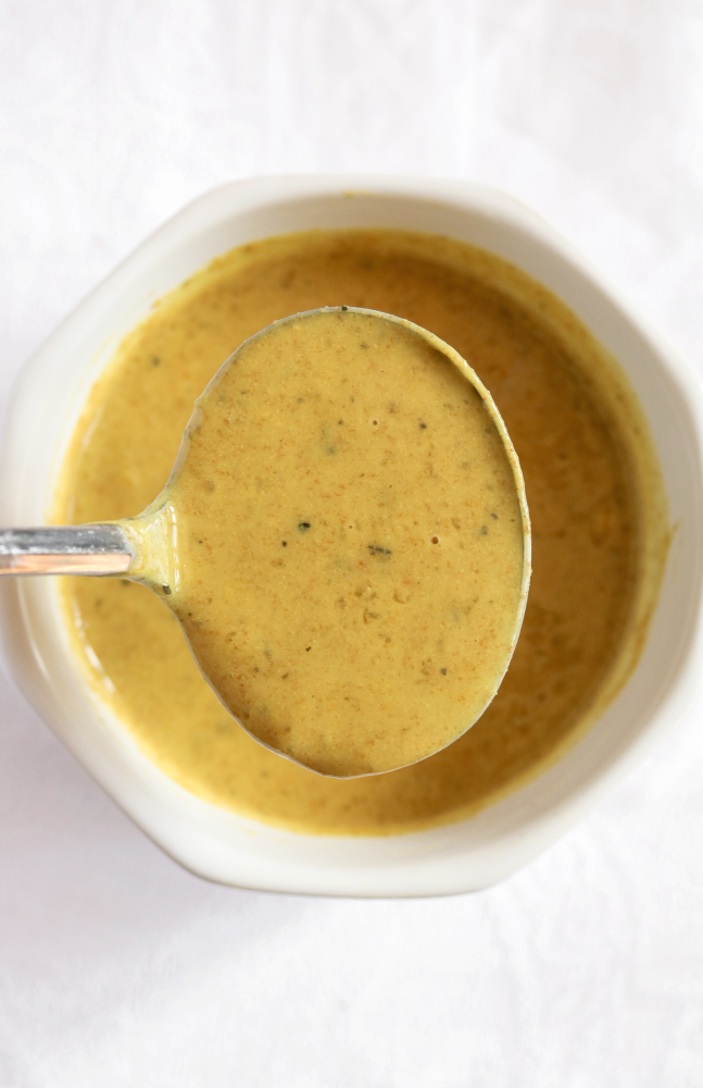 This vegan gravy is perfect for your Thanksgiving or Christmas table. It packs a ton of flavor and is SO easy to make but free of gluten + oil! #vegan #gravy #veganrecipe #vegetarian #thanksgiving // plantpowercouple.com