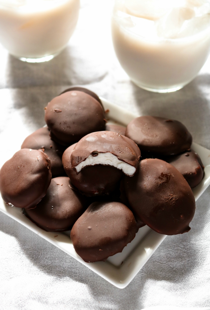 Homemade Vegan Peppermint Patties made with Baileys Almande - an easy no-bake treat that's beyond perfect for the holidays, summer, St Patrick's Day, Valentine's Day, or really ANY time! // plantpowercouple.com #vegan #dessert #recipe #chocolate #baileys