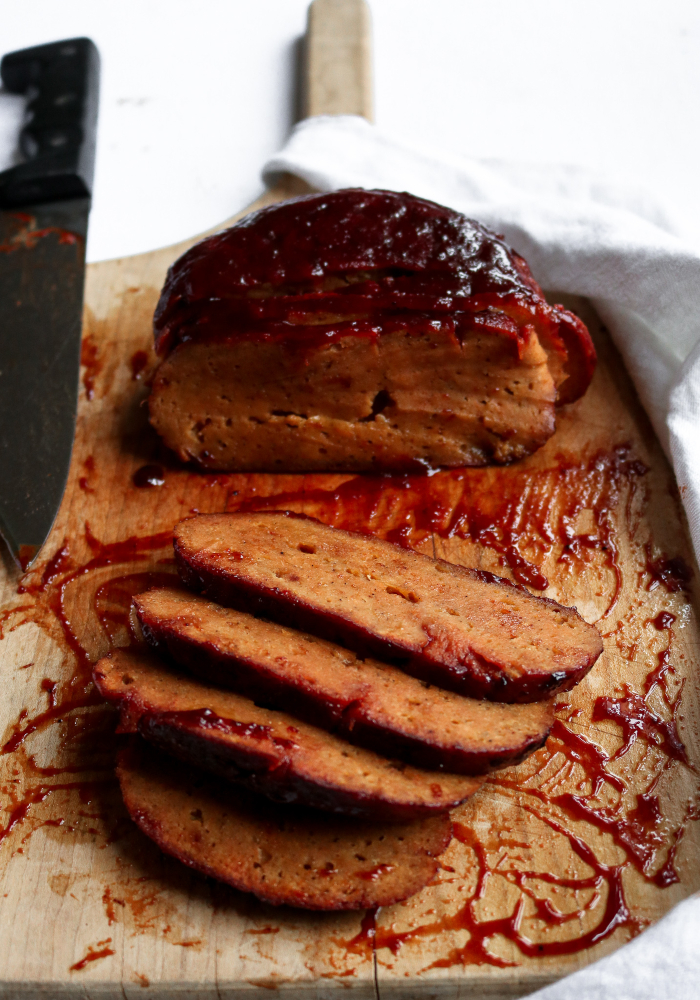 Make this vegan seitan ham when you really want to impress! It's full of smoky-sweet flavor and glazed with a pineapple mustard sauce that blow your mind. Beet puree is added for extra color and WOW factor. #seitan #vegan #vegetarian // plantpowercouple.com