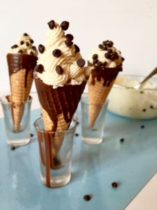 These Vegan White Chocolate Cannoli Cones would be perfect for a birthday party, shower, or just a plain ol' Thursday night! They're SUPER easy to make, 8 ingredients (plus a cone!) and totally able to be customized to your tastes. Cannoli bar, anyone? :) // vegan cannoli cones: plantpowercouple.com