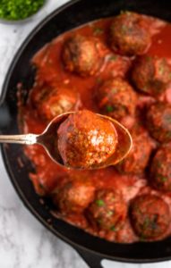 The BEST Vegan Meatballs made with TVP. They're SUPER meaty, full of spicy Italian flavor, and NOT mushy - our #vegan #meatball dreams come true! #vegetarian #veganmeatballs #plantbased #plantpowercouple // plantpowercouple.com