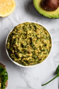 This avocado chickpea spinach mash is an easy + healthy veganl lunch recipe that you can make ahead of time! Gluten-free and oil-free options. #vegan #plantbased #veganlunch #sandwich #chickpeas // plantpowercouple.com