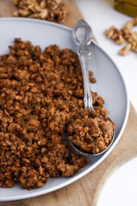 This vegan sausage-style walnut meat is a great option for topping pizzas, pasta, and even breakfast tacos! We love how easy it is to make. #vegan #walnuts #recipe #plantbased //plantpowercouple.com