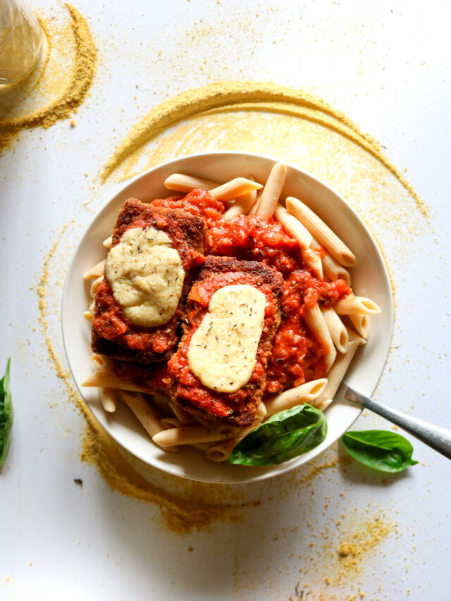 The BEST vegan chicken parmesan we've ever tasted! You won't believe these cutlets are made with tofu after you're done with them, and that peppery breading really knocks it outta the park. Gluten-free option, and the cutlets are freezer-friendly! // plantpowercouple.com