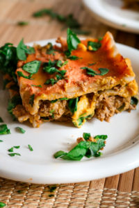 This Vegan Tikka Masala Lasagna is pure comfort food! All the things you love about traditional lasagna but with an Indian-inspired flavor that will knock you off your feet! Easy to make and freezer friendly too! // plantpowercouple.com