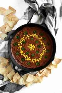 This hot walnut sausage dip may not be the prettiest appetizer on the table, but you'll forget all that the minute you take a bite. So much flavor, a rich, stick-to-your-ribs texture, and easy to make #vegan #appetizer! // plantpowercouple.com