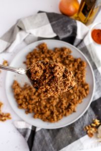 This spicy beef-style walnut meat is our go-to recipe for Taco Tuesday and beyond! It's easy to make, with only 9 ingredients and 5 minutes of active time, and the flavor is totally addictive. #vegan #walnuts #vegetarian #veganrecipes