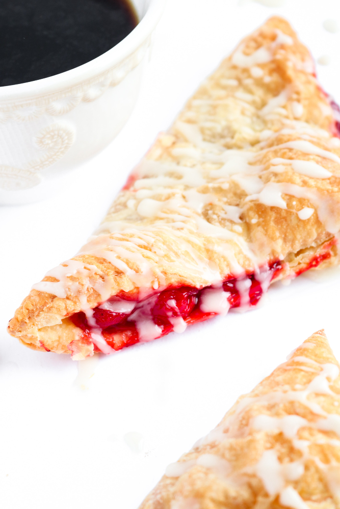 These vegan cherry turnovers are so sinfully simple and devilishly delicious! With just two ingredients, even the most beginner of cooks can have these gorgeous bakery-style beauties done and ready to eat - for breakfast OR dessert - in just under an hour. ﻿#vegan #breakfast #turnover #cherries // plantpowercouple.com