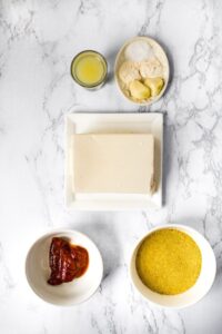 Overhead photo of all the ingredients you need to make vegan queso out of silken tofu