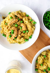This easy slow cooker vegan chicken and rice is classic comfort food made vegan! Great for a busy weeknight or meal prep session, it's also healthy, gluten-free, and can easily be made oil-free. #vegan #crockpot #slowcooker #rice #soycurls // plantpowercouple.com