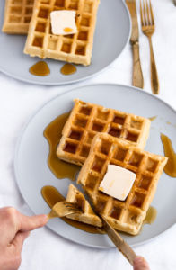 Easy, ten-ingredient, freezer-friendly and toaster-friendly homemade vegan waffles. Simple enough for the beginner cook to dazzle and the perfect addition to a Sunday brunch… or a Thursday dinner! #vegan #waffles #dairyfree #breakfast // plantpowercouple.com
