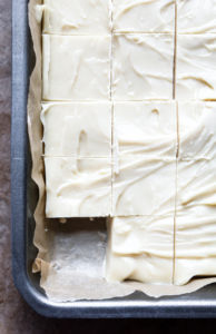 This 6-ingredient Vegan White Chocolate Fudge is the dessert of your summer dreams! It’s decadent and delicious, takes about 15 minutes of active time to make + even includes a low(er) sugar trick we love. #vegan #dairyfree #fudge #whitechocolate #veganchocolate // plantpowercouple.com