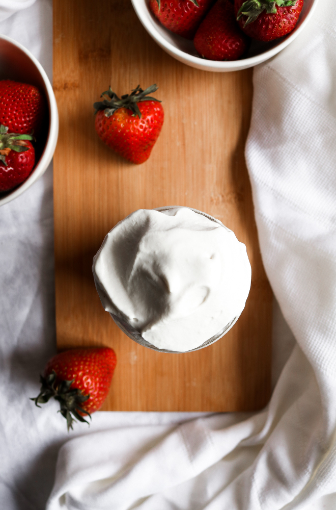 This 5-ingredient vegan whipped cream is easy to make, stable AF, and freezer-friendly. It’s a fantastic addition to sundaes, pancakes, or a big bowl of strawberries - the PERFECT summer treat! #vegan #dairyfree #dessert #recipe // plantpowercouple.com