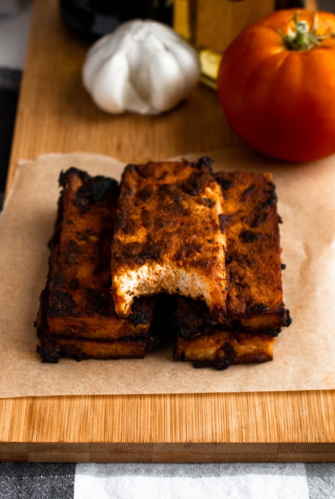 These Balsamic Tomato Tofu Cutlets are crazy meaty, full of balsamic-tomato-garlic-y flavor thanks to a dynamite tofu marinade, and very easy to make! They are meal-prep and freezer-friendly and pair beautifully with pasta, on a sandwich, or straight off the pan. #vegan #tofu #balsamic #plantbased #veganrecipes #tofurecipes // plantpowercouple.com