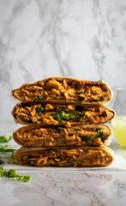 This vegan crunchwrap is delicious, easy, and just plain FUN. It makes an awesome vegan dinner or lunch recipe that can be prepared ahead of time and totally customized to your tastes. #vegan #crunchwrap #plantbased #plantpowercouple // plantpowercouple.com