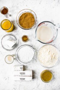 Overhead photo of all the ingredients you need to make vegan cinnamon roll pancakes
