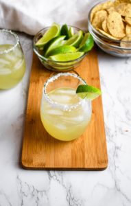 This is our go-to homemade margarita recipe! It’s simple, using only 4 ingredients and perfect for date-night-in or Taco Tuesday! It’s easy to make and the best combination of sour, sweet, and salty. #vegancocktail #cocktail #margarita #lime #tequila #vegancocktailrecipe #homemade #tacotuesday
