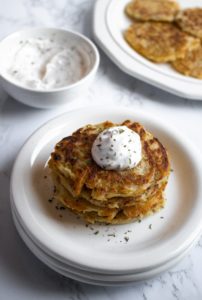 Easy vegan potato pancakes make a great side for a plant-based breakfast, dinner, or just snacking! A simple egg-free recipe with BIG flavor, requiring only 9 ingredients and basic methods. #vegan #eggfree #potato #potatopancake #potatorecipes #veganbreakfast #boxty #latkes