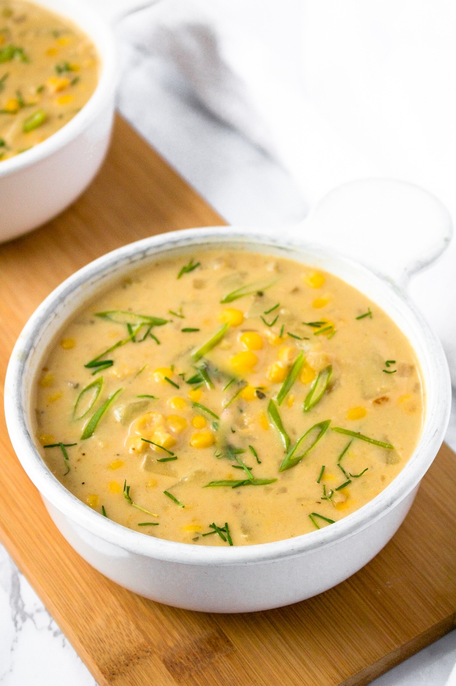 This creamy corn chowder is oil-free, gluten-free, and (of course) vegan! It’s an easy, cozy, flavorful, and HEALTHY plant-based dinner option, and leftovers can be frozen for later - making it ideal for busy weeknights or weekly meal prep! The recipe is from the new cookbook from Caitlin Shoemaker (creator of From My Bowl!): Simply Delicious Vegan.
