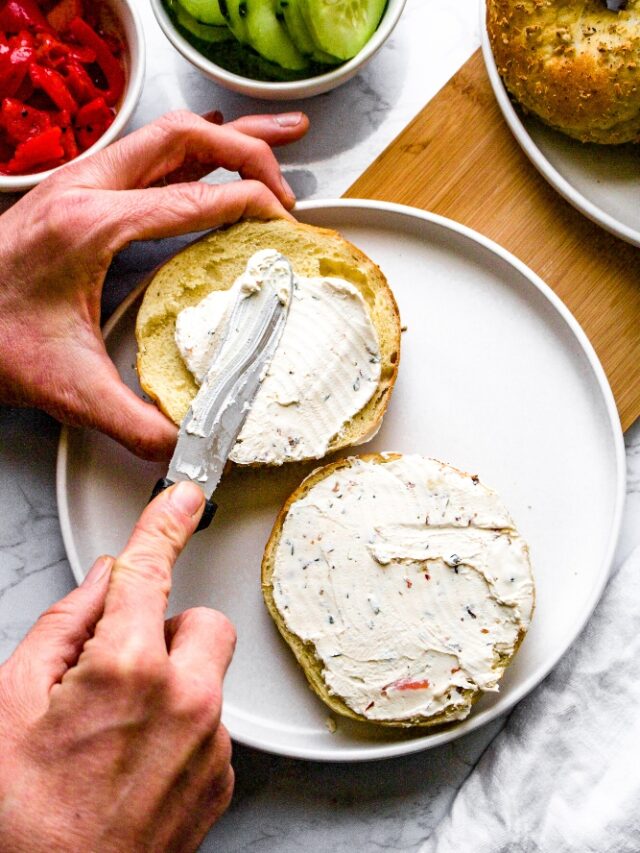 This easy vegan cream cheese recipe has had me happy-dancing around the kitchen every morning this week! It’s bursting with flavor, has a soft creamy texture you have to taste to believe while still being nut free, and requires very minimal effort on your part. Use this dairy free cream cheese substitute as a dip for crackers or bagel chips or spread it all over bagels and toast. #vegancheese #tofu #dairyfree #veganbreakfast