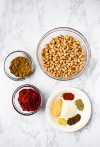 Healthy Vegan Baked Beans Ingredients: white beans, tomato paste, brown sugar, and spices.