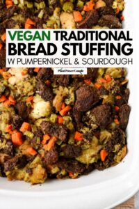 Overhead view of a white rectangular casserole dish filled with vegan stuffing with text reading vegan traditional bread stuffing with pumpernickel and sourdough