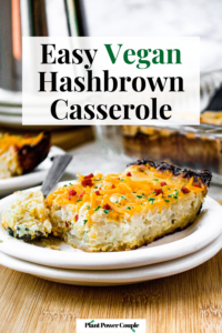 Head on shot of a slice of vegan hash brown casserole with a fork next to it that has a bite taken out of the casserole on it. There's another slice of casserole as well as the full baking dish in the background. Text reads: easy vegan hashbrown casserole