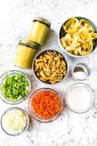 Overhead shot of all the ingredients you need to make vegan chicken noodle casserole.