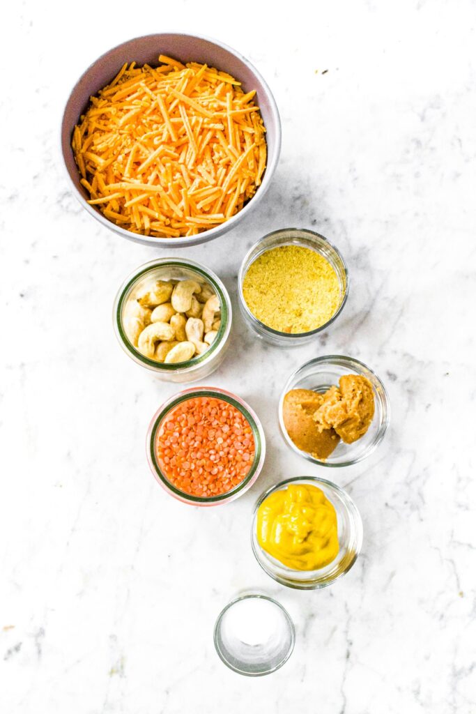 Overhead shot of all the ingredients you need to make dairy-free and gluten-free cheddar cheese soup substitute that's also healthy!