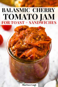 Close up overhead shot of a clear glass jar of grape tomato jam with a slice of rustic bread and tomato jam behind it. Text reads: balsamic cherry tomato jam for toast and sandwiches