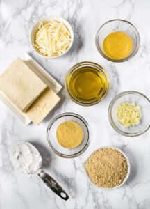 Overhead shot of all the ingredients you need to make vegan tofu parmesan