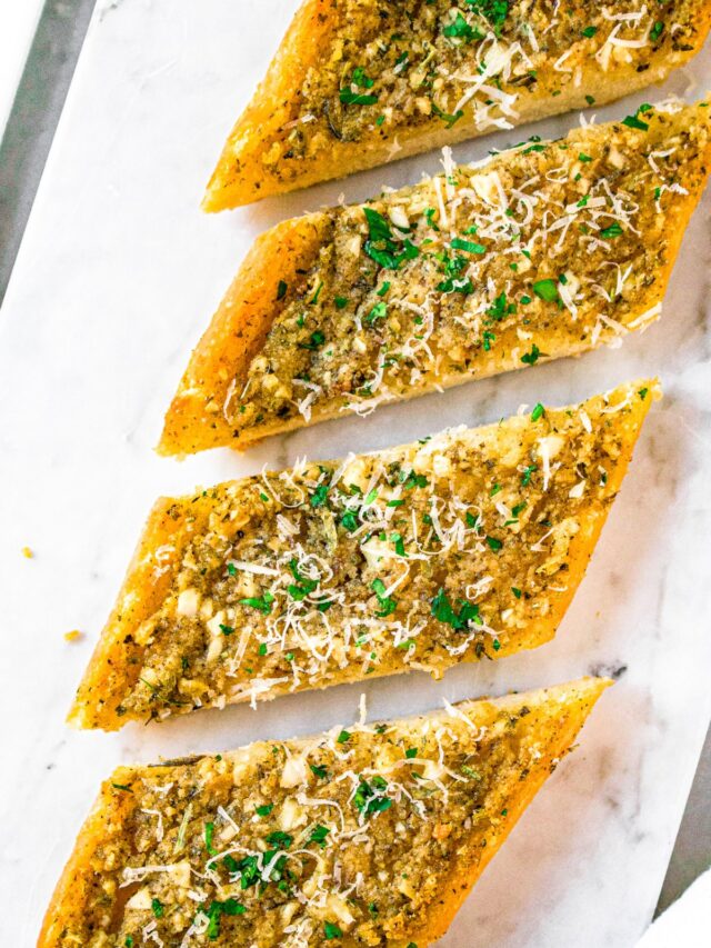 Overhead photo of a diagonal row of garlic bread slices
