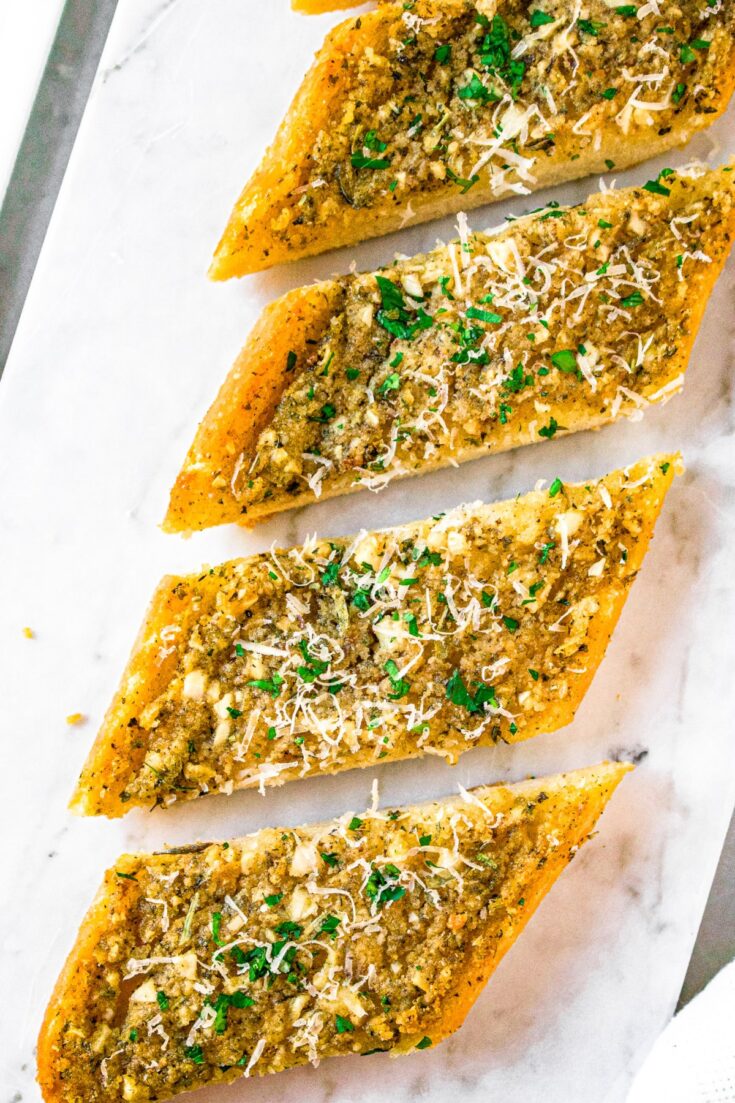 Overhead photo of a diagonal row of garlic bread slices
