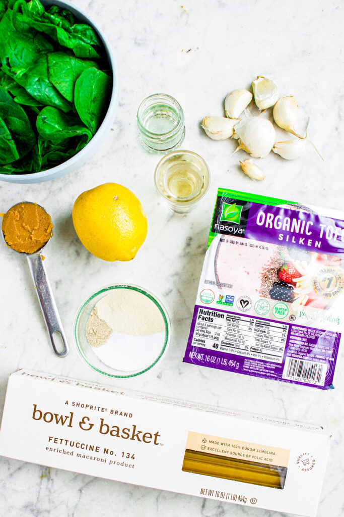Overhead photo of all the ingredients you need to make a creamy dairy-free pasta recipe.