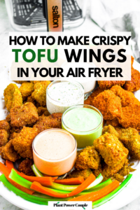 Close up overhead photo of a platter with various tofu wing flavors surrounding 5 small glass bowls with various dipping sauces. Text reads: how to make crispy tofu wings in your air fryer