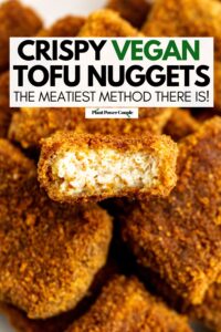 Overhead close up view of a pile of tofu nuggets with a bite taken out of the top one and text reading crispy vegan tofu nuggets, the meatiest method there is