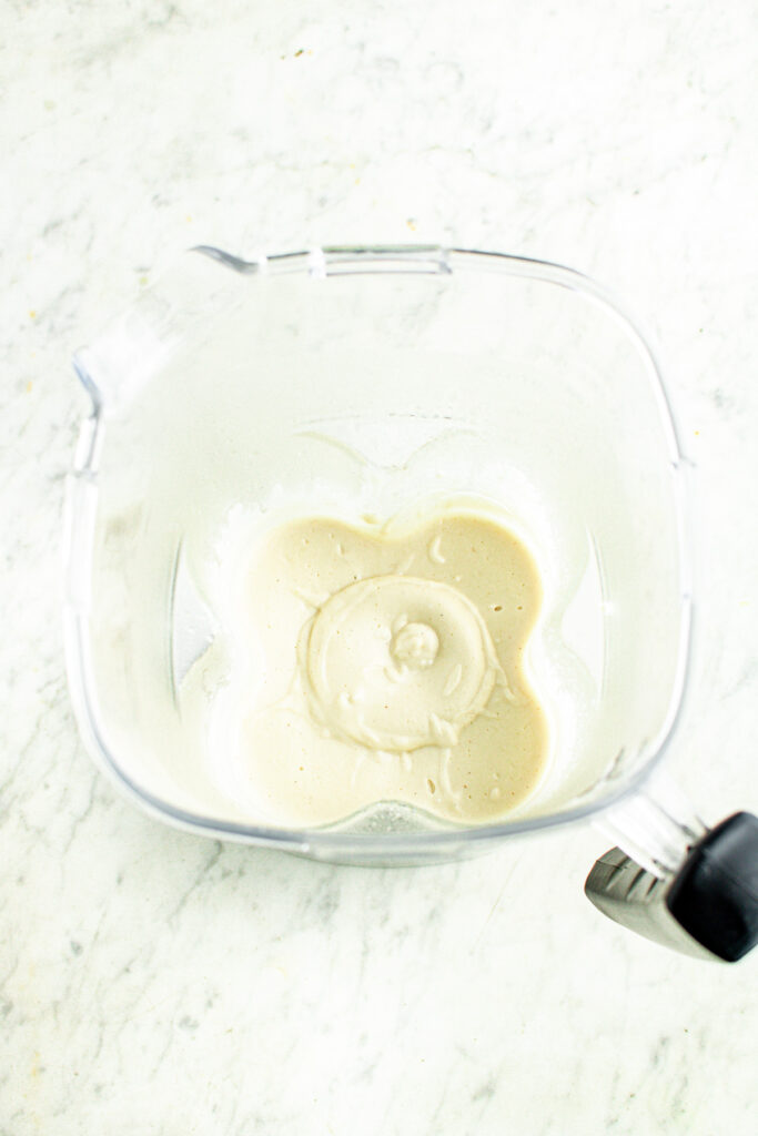 Overhead view of what that cashew cheese mixture looks like when it's finished being blended - creamy and shiny